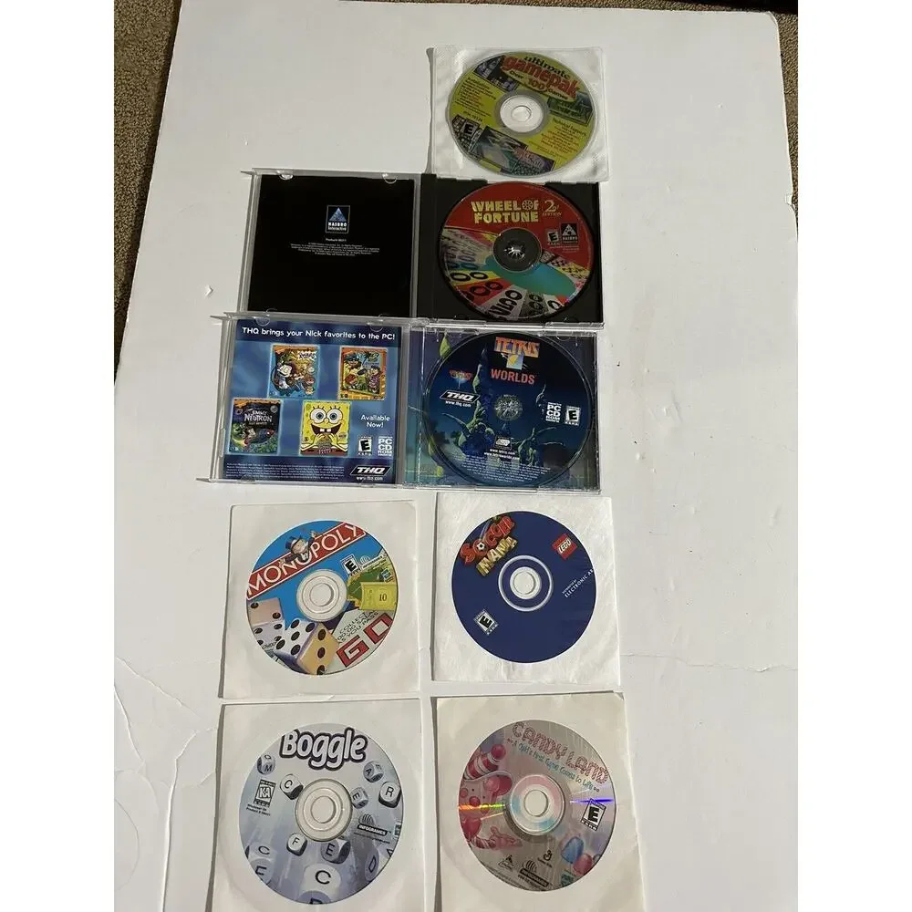 PC Game Lot 7 Gamepack 100 Monopoly Boggle Tetris Candyland Soccer Wheel Fortune